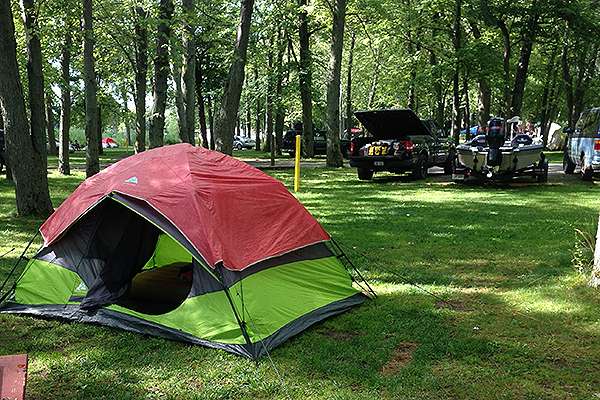 Hereâs another view of my tent in the tent camping area at Oneida Shores Park. My truck and boat are in the background.