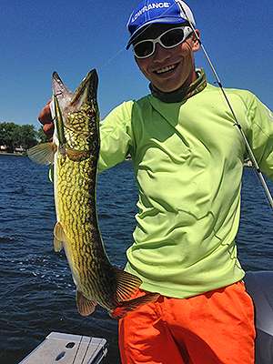 Tyler Berthold holds up one of the many pike we caught the afternoon I fished with him and Jonathan Shoemaker.
