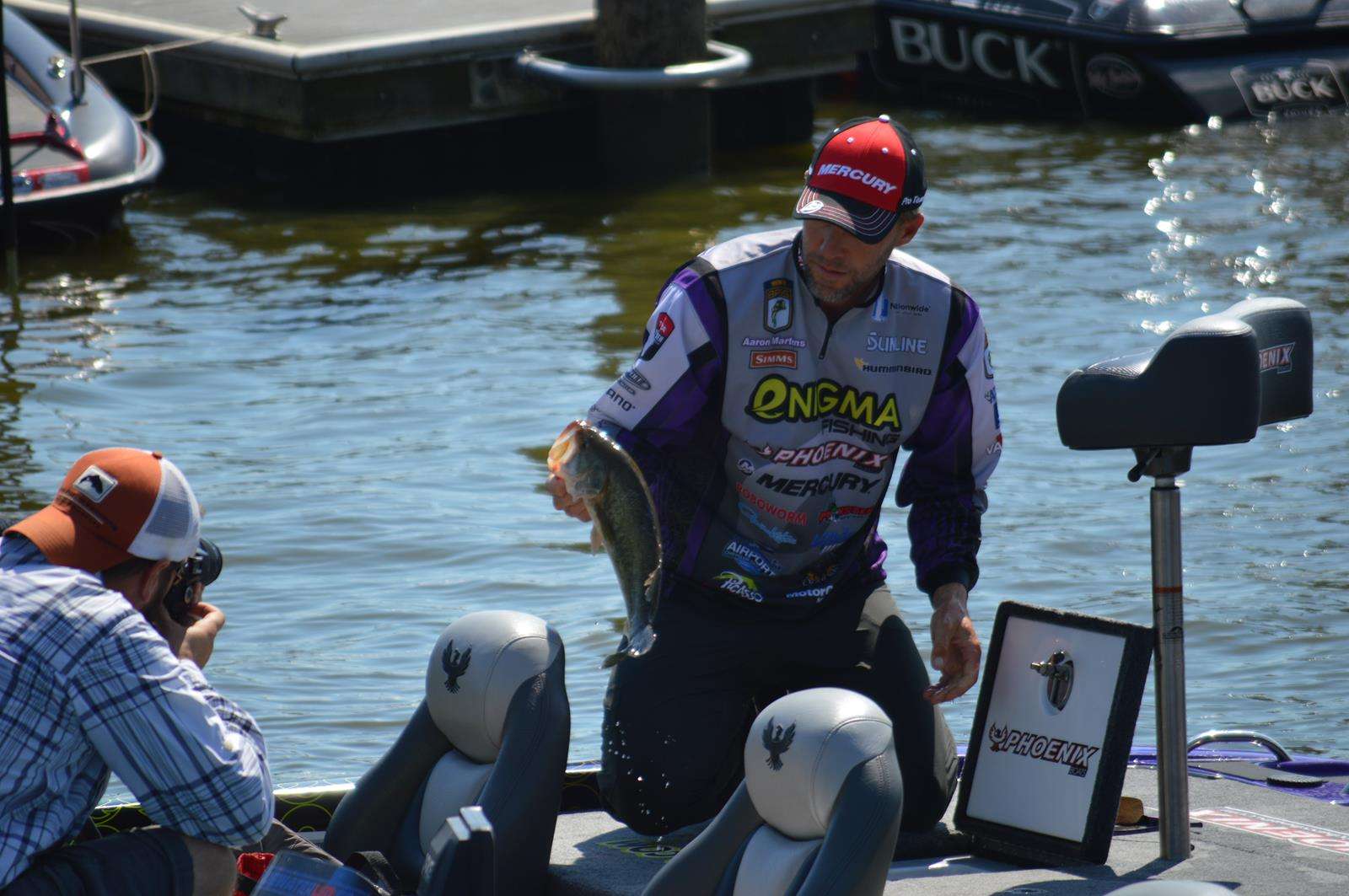 Aaron Martens brings out a couple nice fish for a photo op.