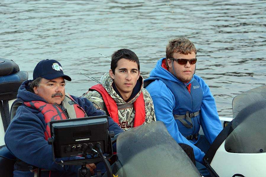 Michigan high school boat captain Michael Hatton with son Clayton and teammate John Dombrowski. 