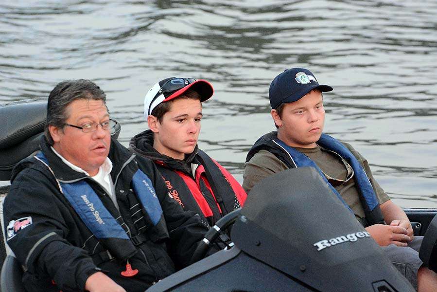 Illinois high school boat captain Tony Cook with son Sean and teammate Tommy Zobel. 