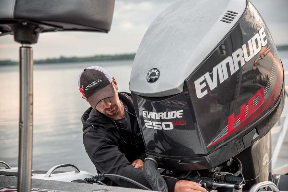 Phoenix angler Renfrew preps his motor for his second day of practice on Oneida Lake. 