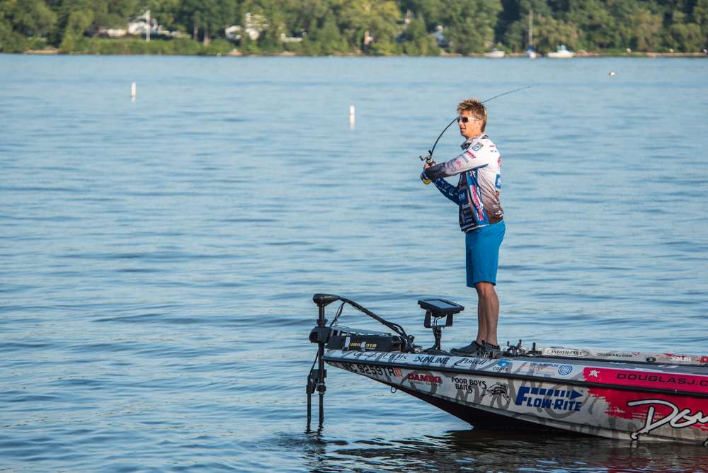 Chad fishes a few more minutes on that dock and then moves to a new spot where he picks up the small crank bait again. 
