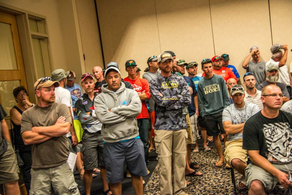 Anglers pack into the meeting room. 