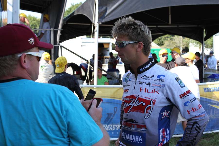 Chad Pipkens gets interviewed for bassmaster.com. He is in second place overall.