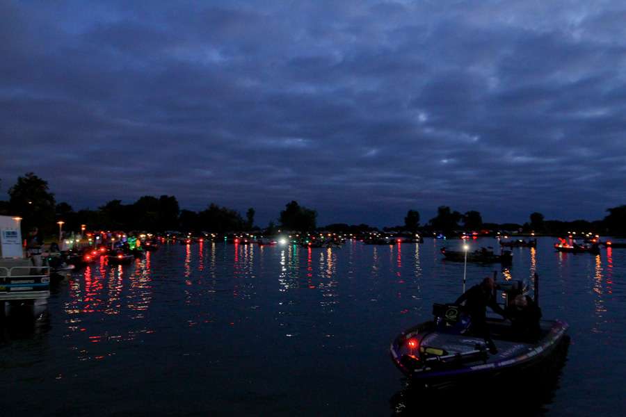 In the foreground Aaron Martens prepares for Day 1 of the Plano Bassmaster Elite at Lake St. Clair. Martens currently leads the AOY standings by 69 points over his closest competitor, Justin Lucas. 