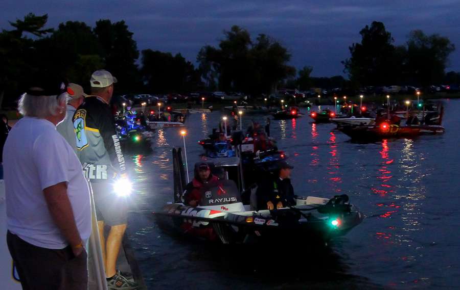 Later flights of anglers begin to position their boats for their morning launch time. 