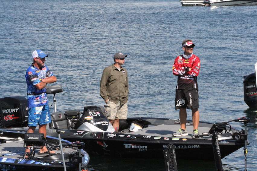 Jeff Kriet and Stephen Browning talk as they wait for an open spot at the dock.