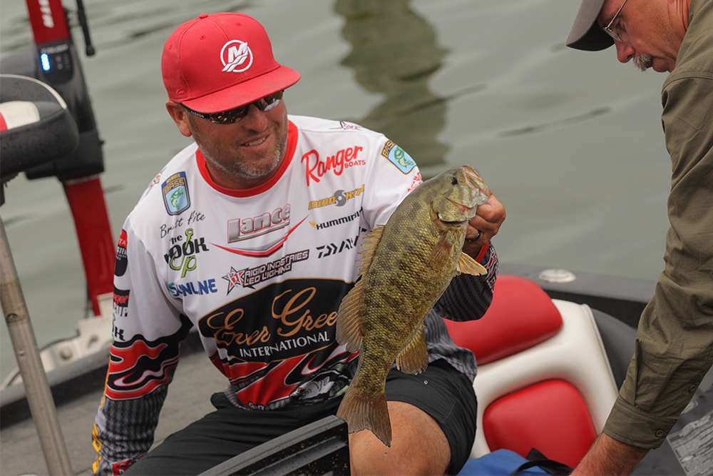 Brett Hite shows one of his nice fish to fans.