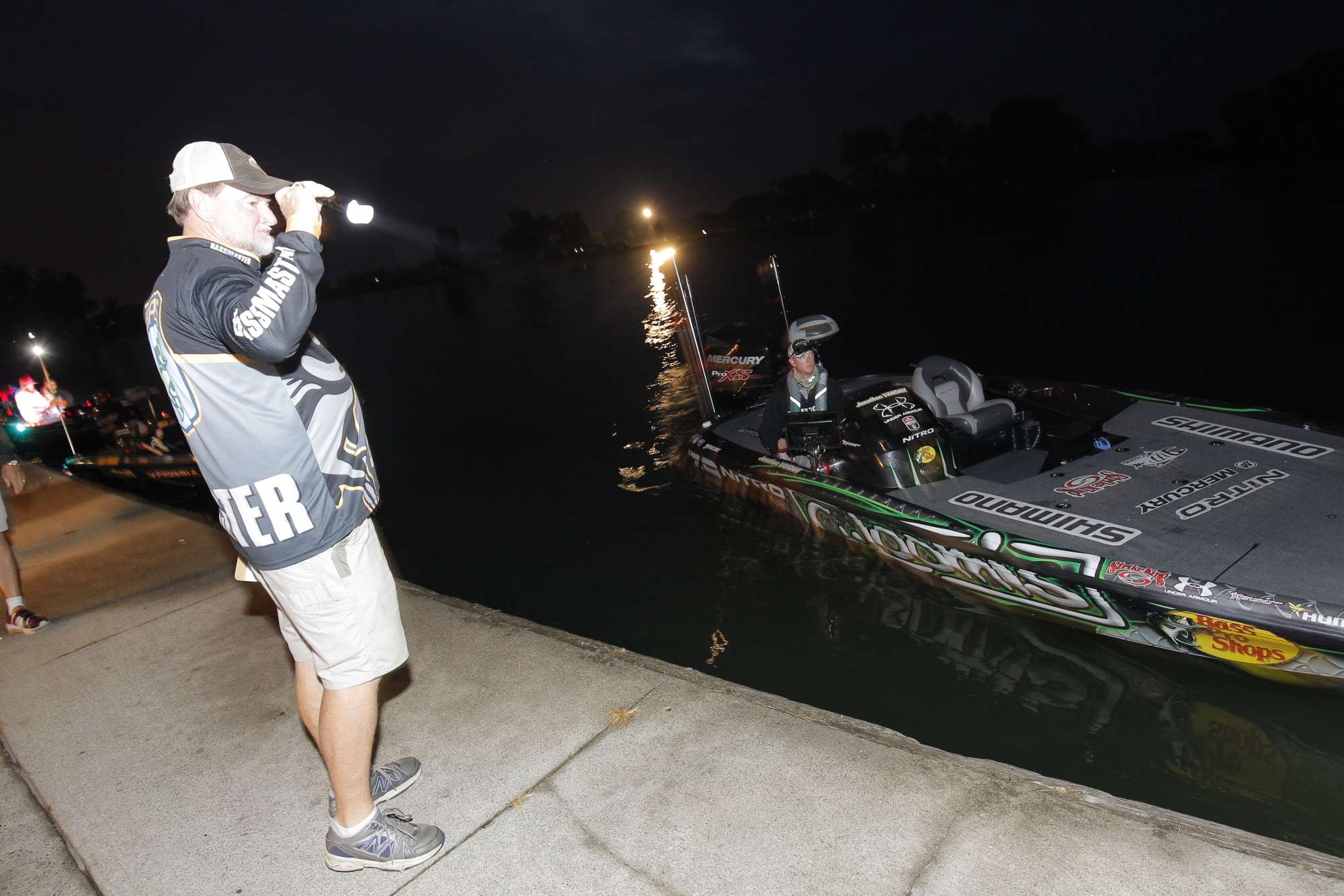 Max Leatherwood guides VanDam into his spot in line.