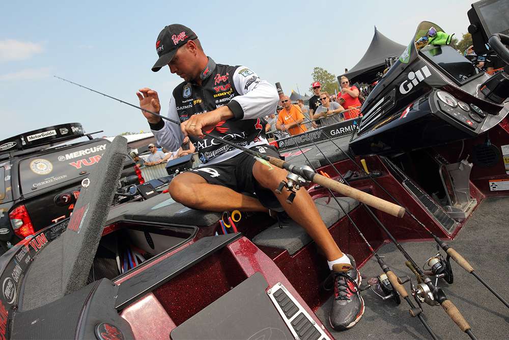 Jason Christie stows his tackle before the final weigh-in of the Plano Bassmaster Elite at Lake St. Clair.