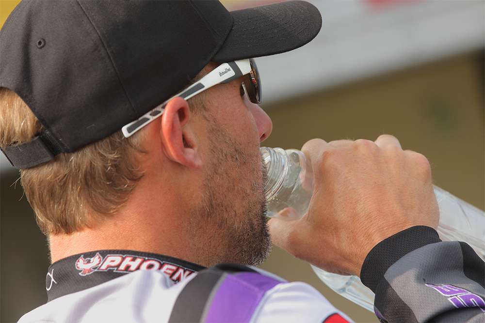 Aaron Martens drinks water right before he gets to the stage.