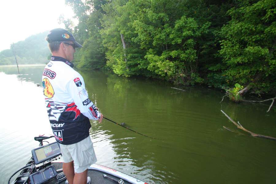 7:48 a.m. Evers grinds a square bill crankbait around flooded wood cover.
