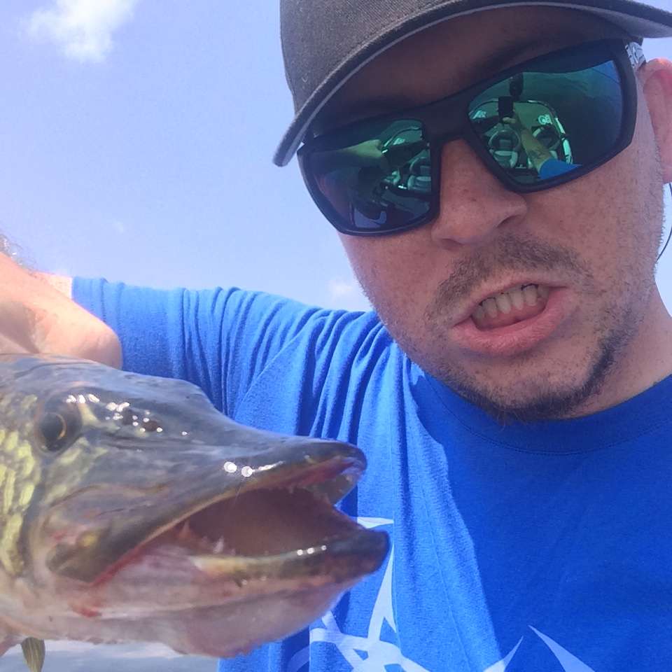 Posing with a with a pickerel.