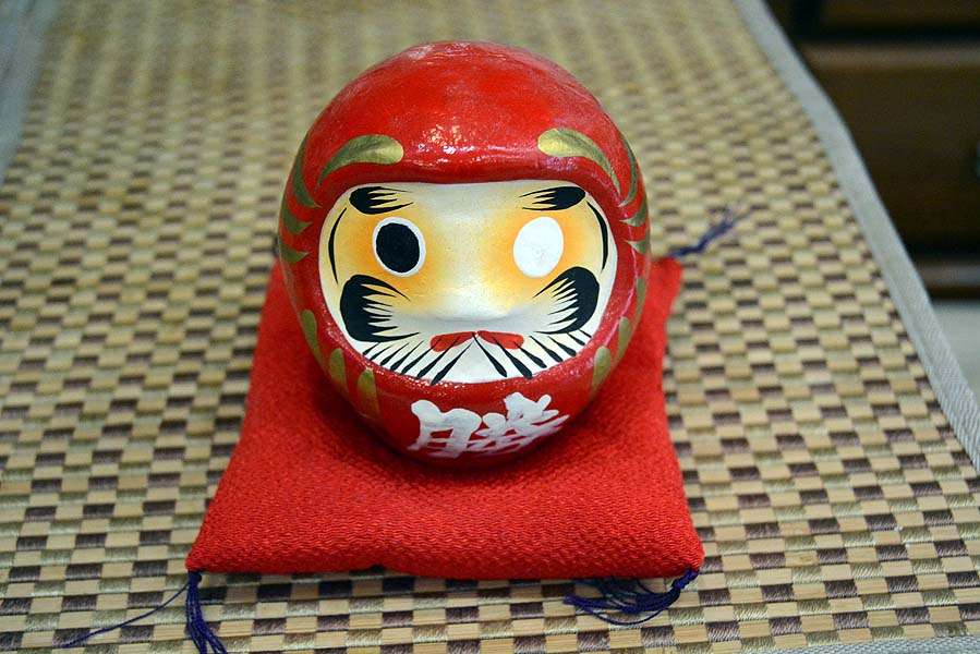 Painting one eyeball of a Daruma doll is a Japanese custom for making a dream come true. When it does, the other eyeball is painted. Shinâs wish is to qualify for the Bassmaster Elite Series. 