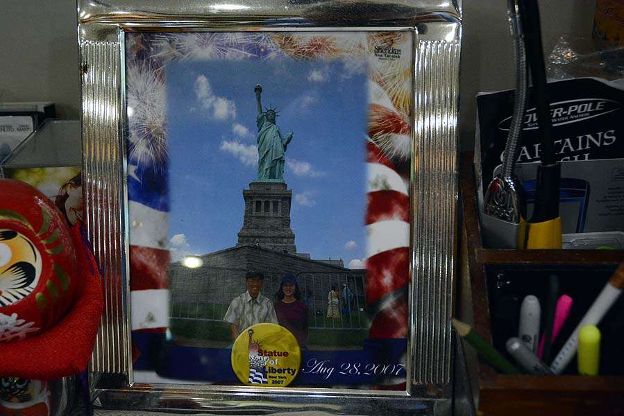 Shin and Miyu are always on the road, and sightseeing is one of the perks. They take lots of pictures but few of each other. This stop was at the Statue of Liberty in 2007. 