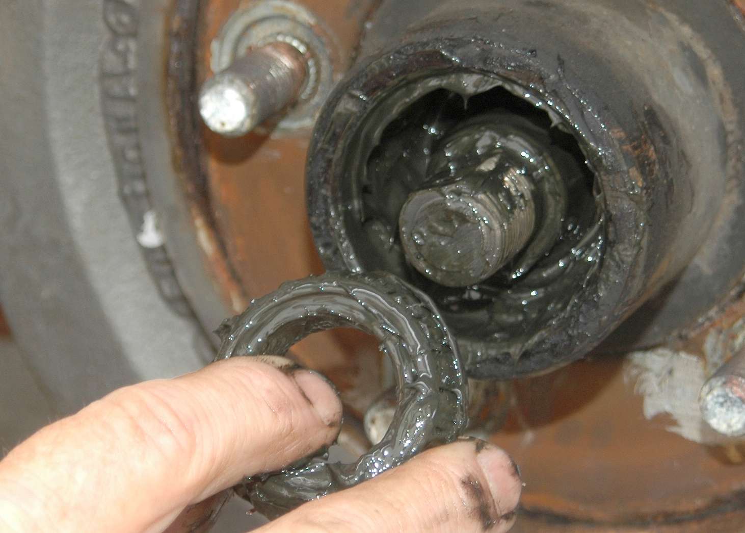 Remove the outer wheel bearing that lies under the big washer.