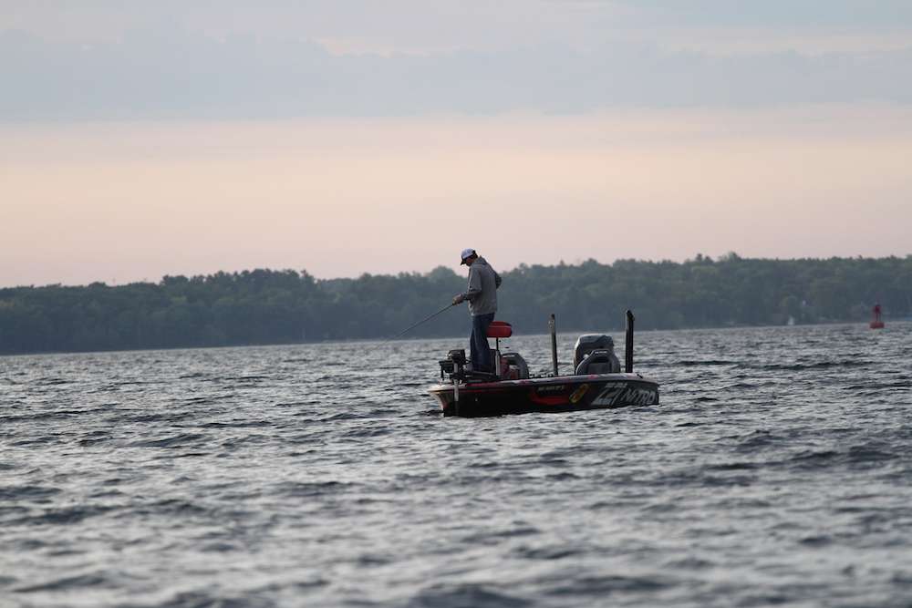 Kevin VanDam fishes nearby.