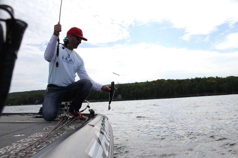 Swindle scoops up another smallmouth before heading out.