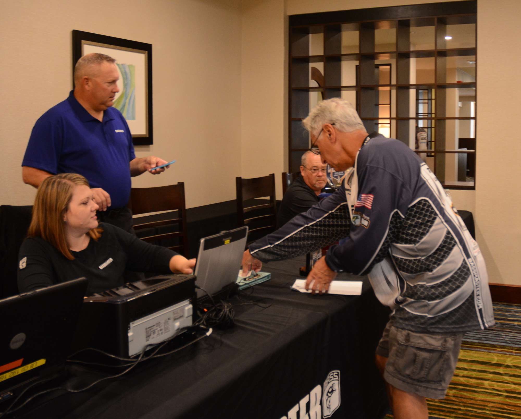 The tournament crew gets set for registration at the Holiday Inn Express in Hartford, Conn.