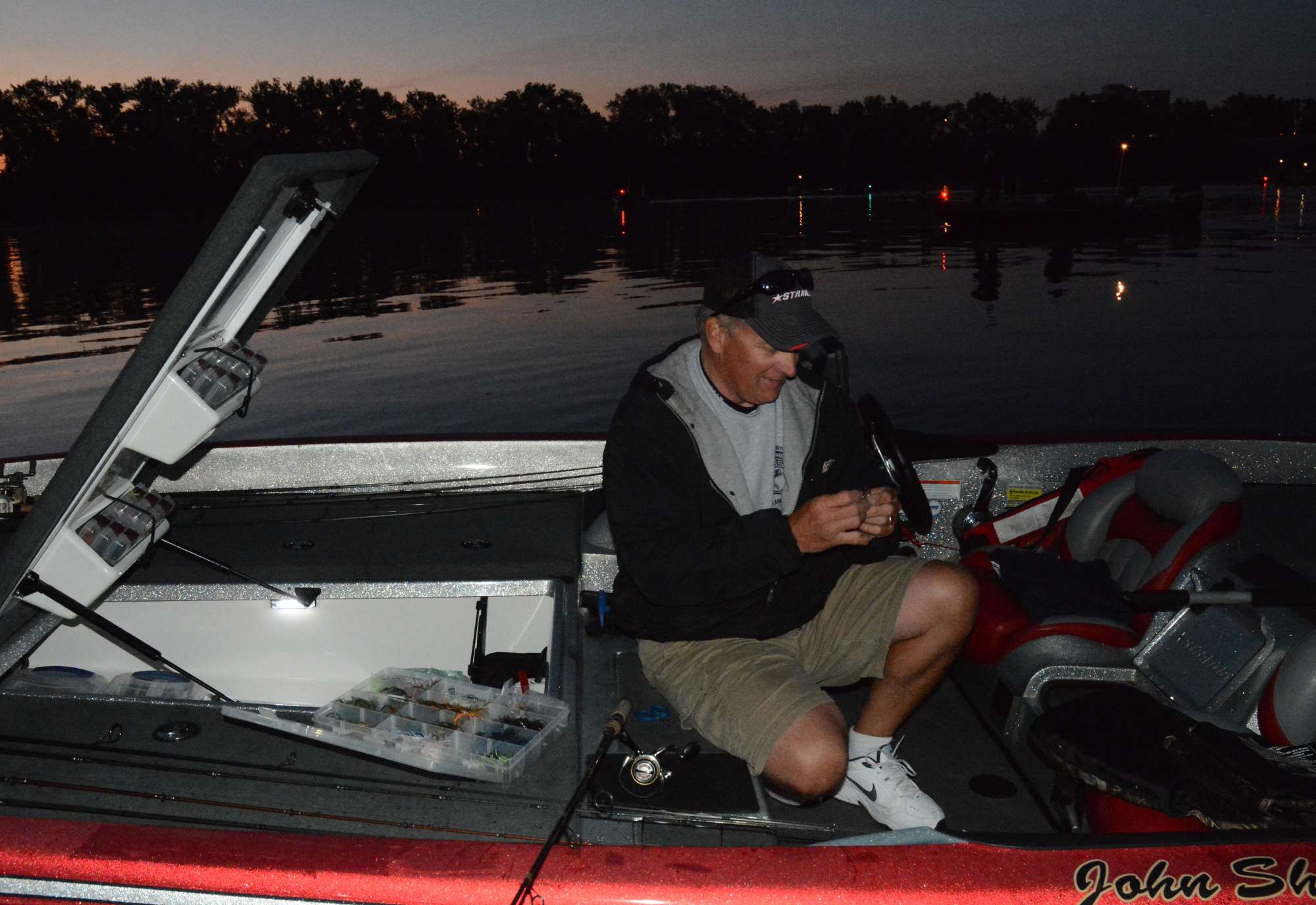 John Shpack of Massachusetts is the first boat in line, and he's getting his tackle ready.