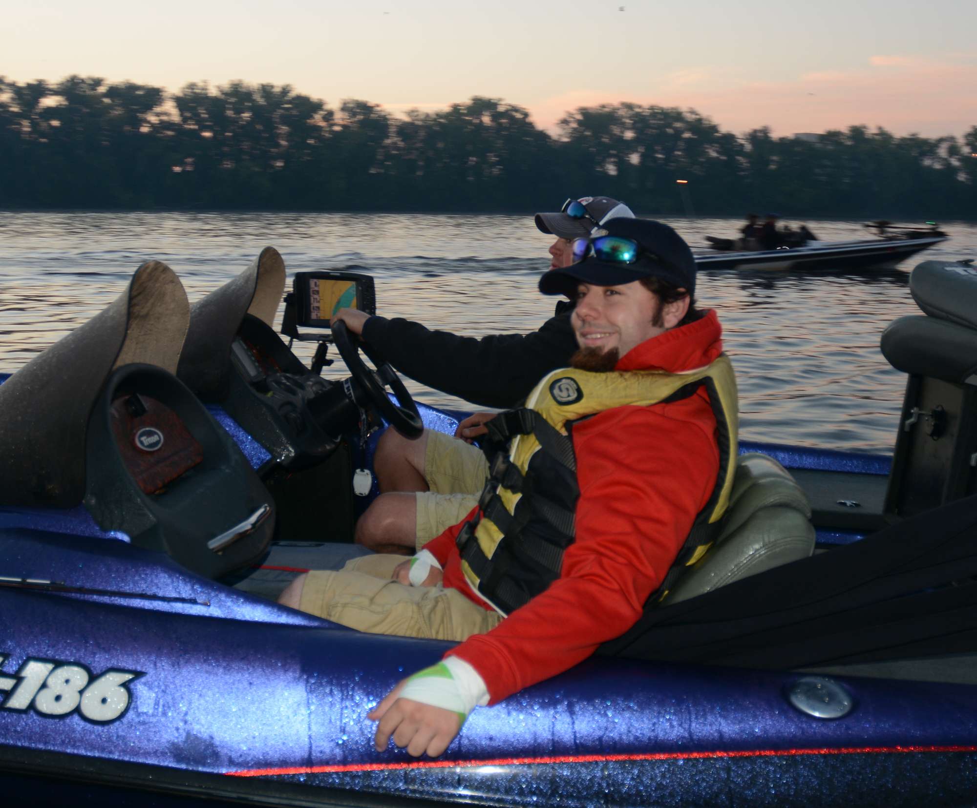 Michael Caudle of Massachusetts rides shotgun as he and Jason Kervin of Maine are the last anglers out.