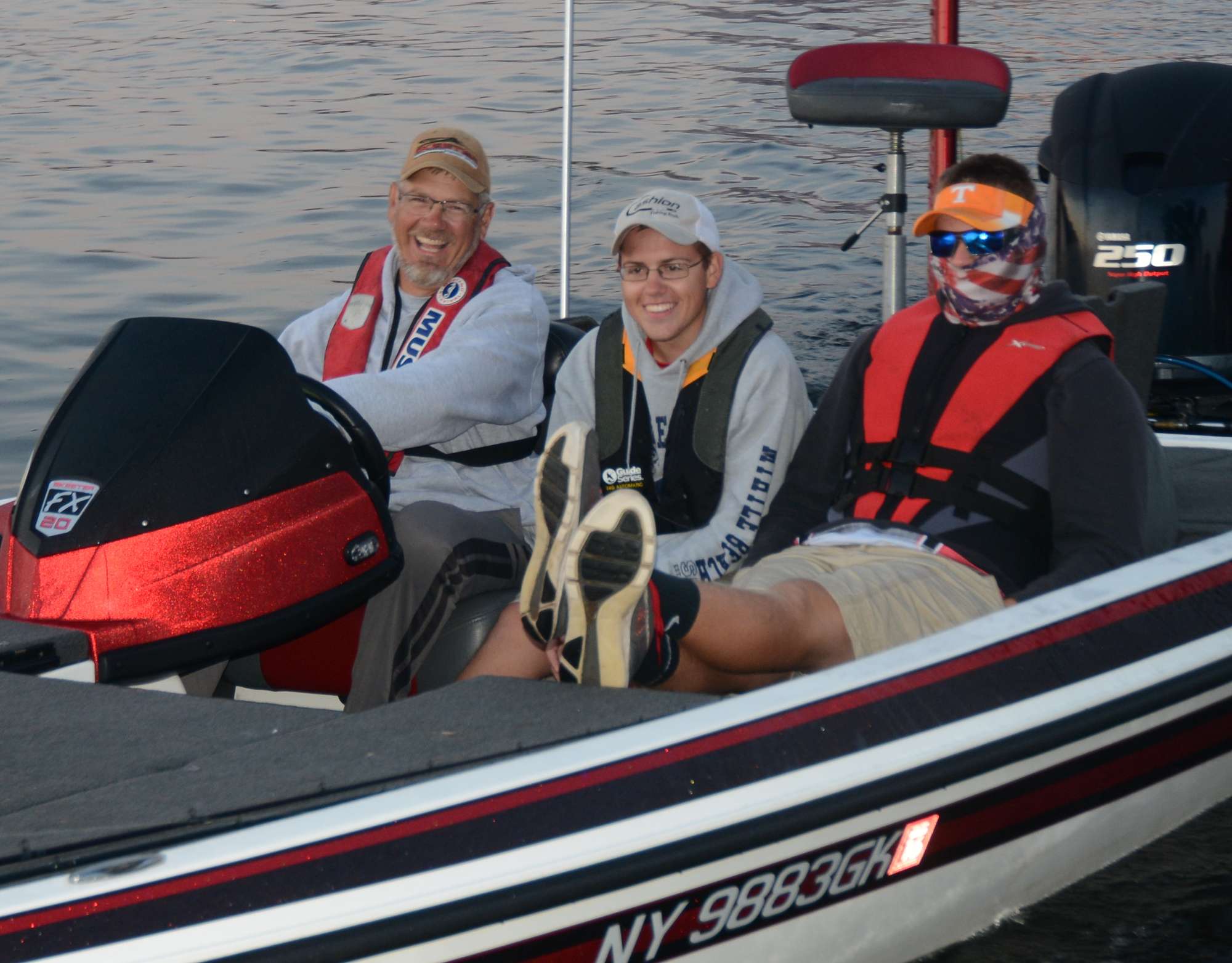 The New York team is all smiles. Joe Matt drives, and Michael Arndt and Ryan Hujar will be fishing today.
