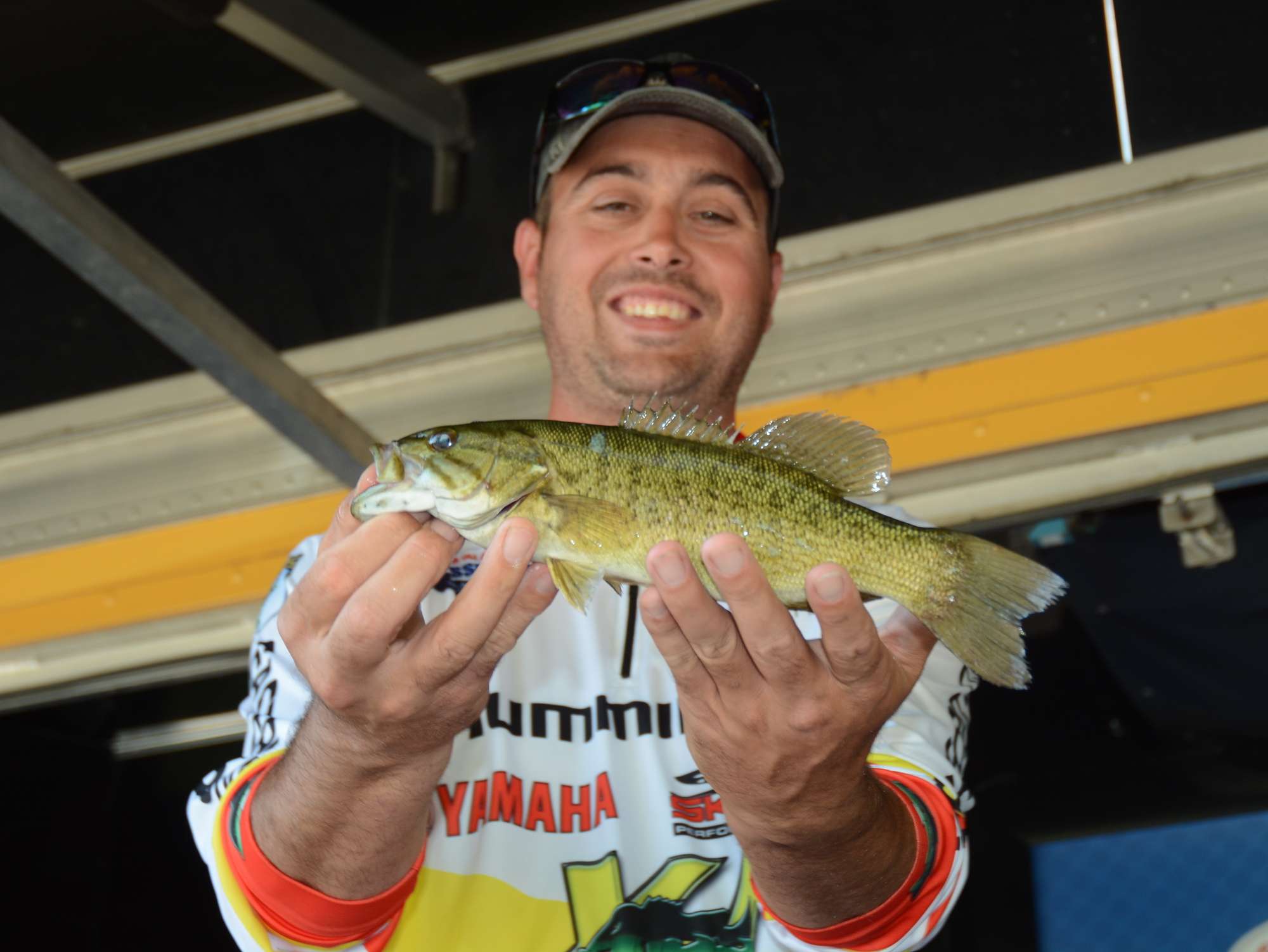 Carlos Montoya Martinez, Spain, with the tournament's smallest bass -- only 9 ounces!