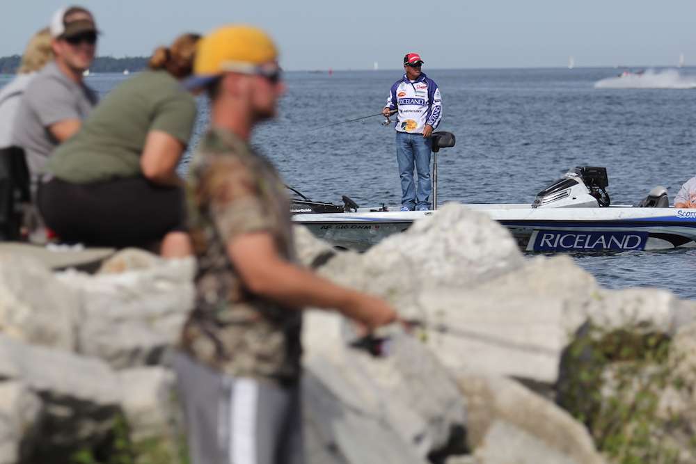 A few other anglers take advantage of this beautiful day. Scott Rook knows he needs about 14 pounds to qualify for the Bassmaster Classic.  