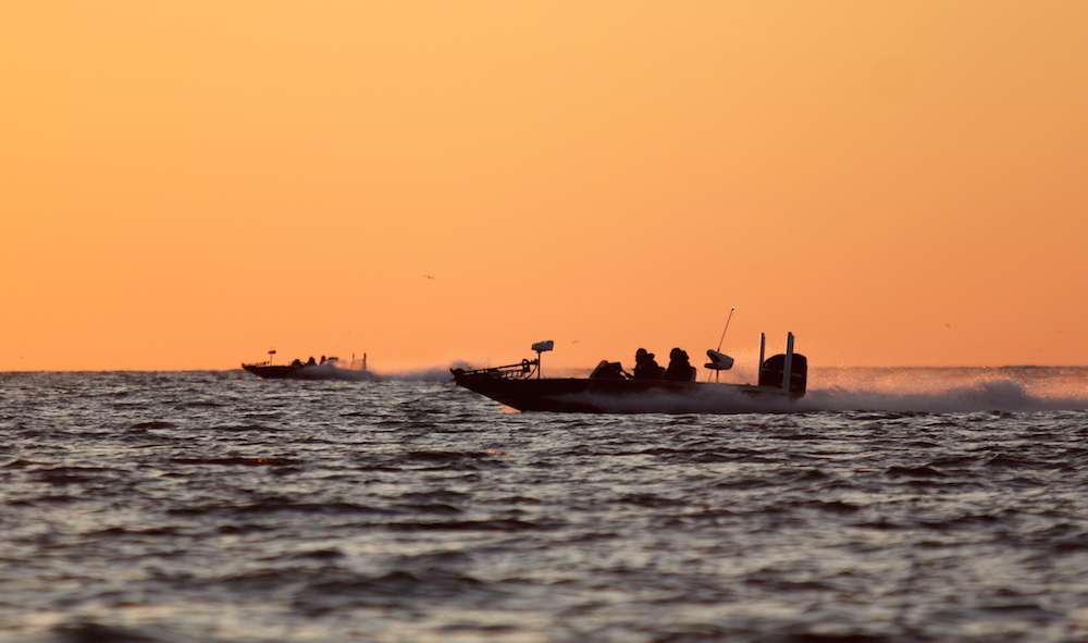 The boats head out onto Lake Erie to chase down giant smallmouth bass. 