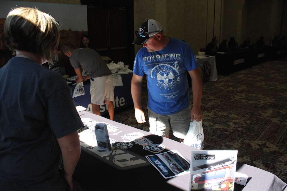 A.R.E. has a booth set up to get people interested in Truck Caps and Tonneau covers.