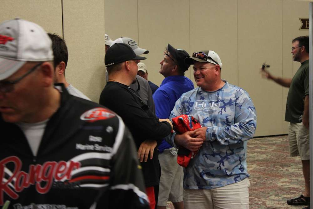 Shane Lineberger and Joe Hamilton share stories while they wait. Lineberger has a chance to qualify for the Bassmaster Elite Series this week. He sits in 3rd place in points.