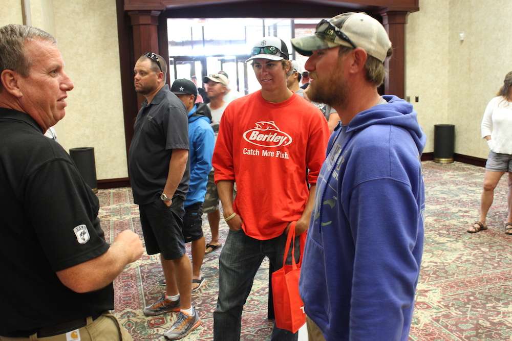 Josh Douglas talks with tournament director Chris Bowes.