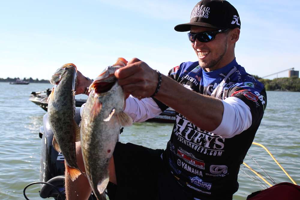 ... while Elite Series pro Carl Jocumsen shows off his fish.