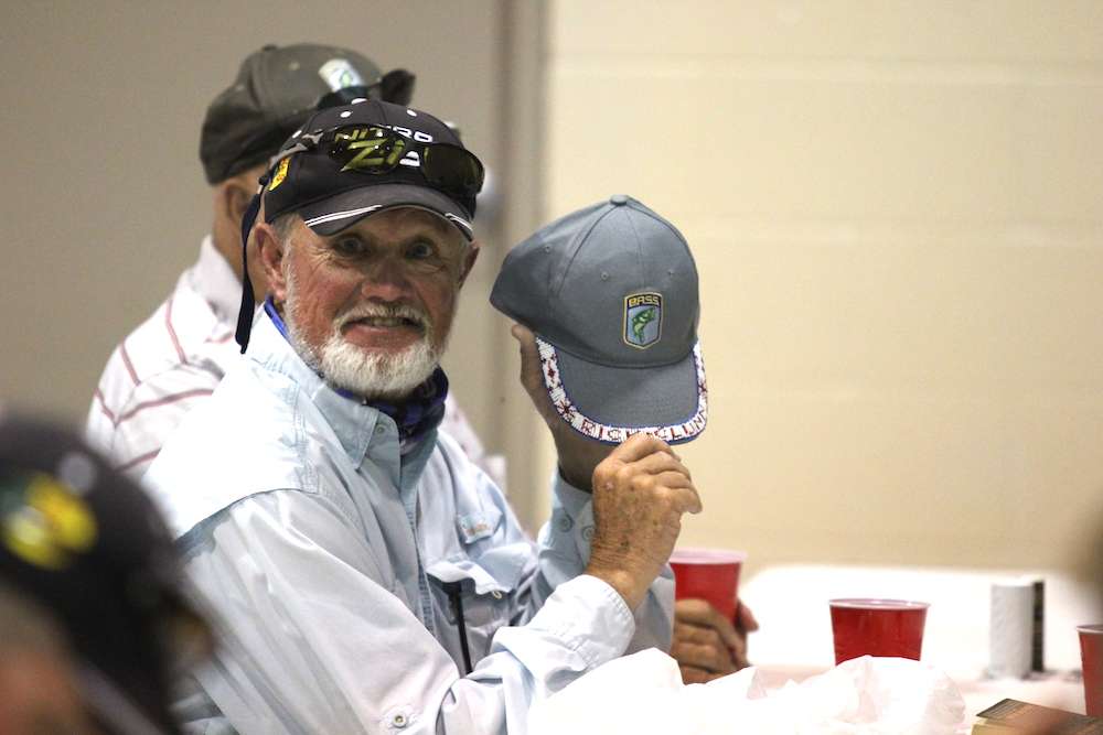 Rick Clunn shows off a customized hat...