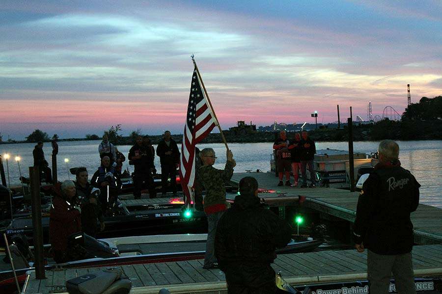 The sun begins to rise over Lake Erie as the anglers pay tribute to the nation.