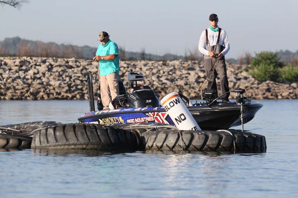 Josh Bertrand works a row of floating tires. 