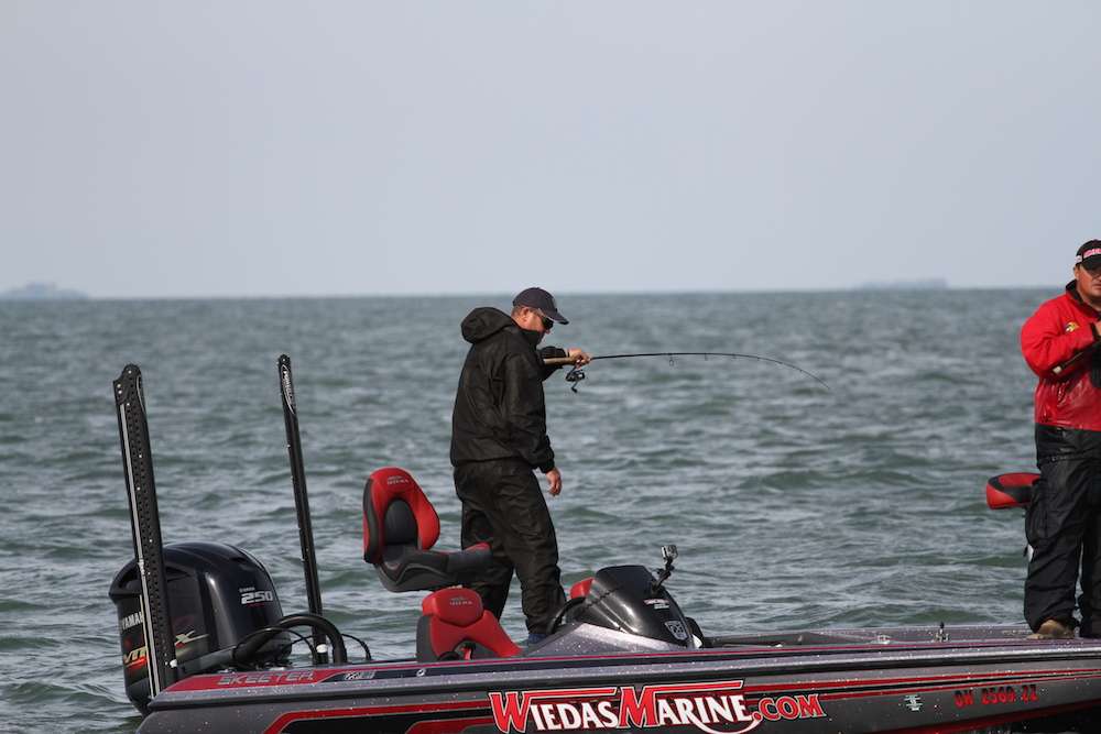 England hooks up and hopes to add to his three-fish co-angler limit.