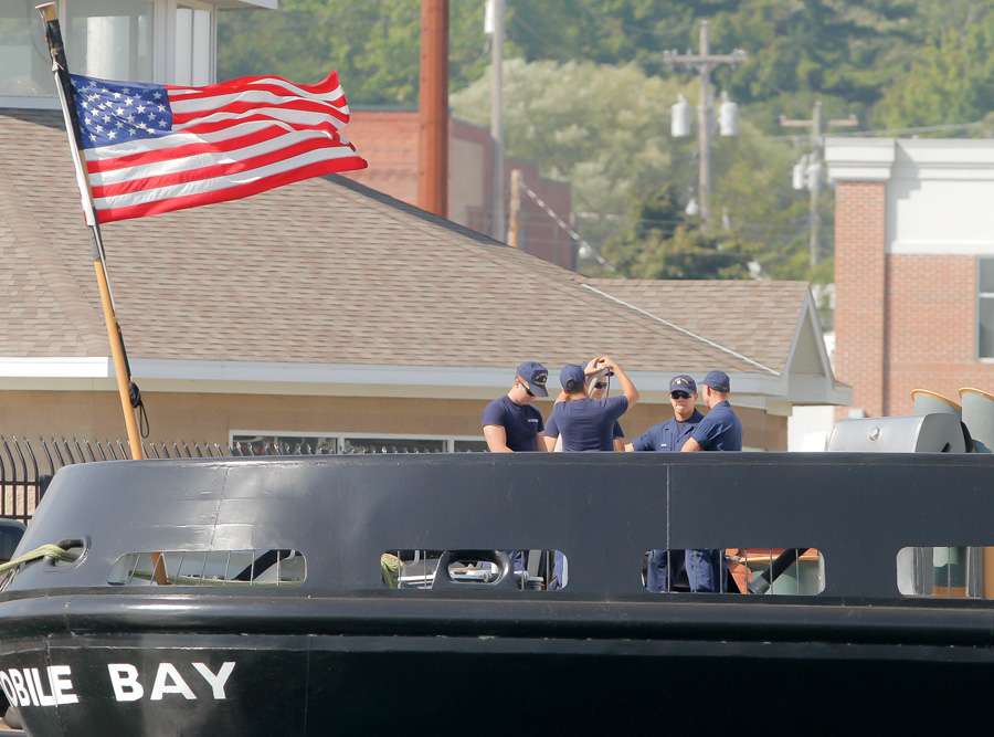 As you can tell from the flag aboard this Coast Guard vessel, the wind has started to blow. 
