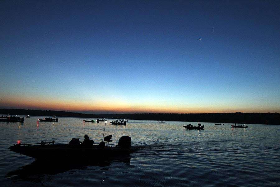 At the upper right the planet Venus appears with the moon in the predawn sky on over Fort Gibson Lake, Sept. 10, 2015, at the Bass Pro Shops Bassmaster Central Open presented by Allstate. 