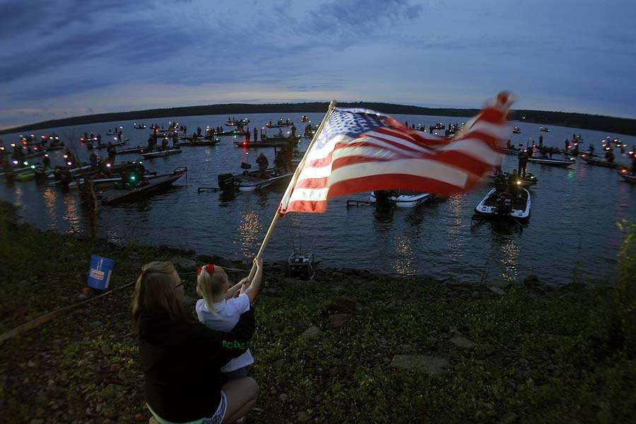 The flag is the focus as the Star Spangled Banner is played at the weigh-in site at Taylors Ferry North. 
