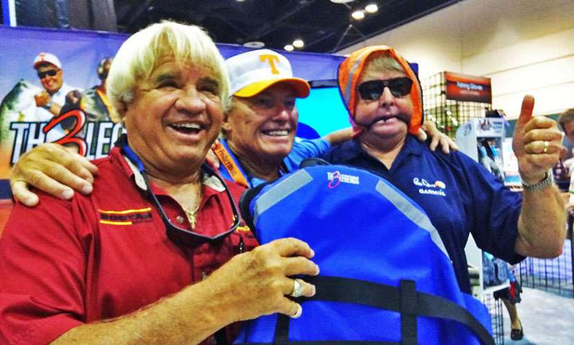 At ICAST 2014, Dance goofs with a life jacket, one of the products their joint venture promotes.  