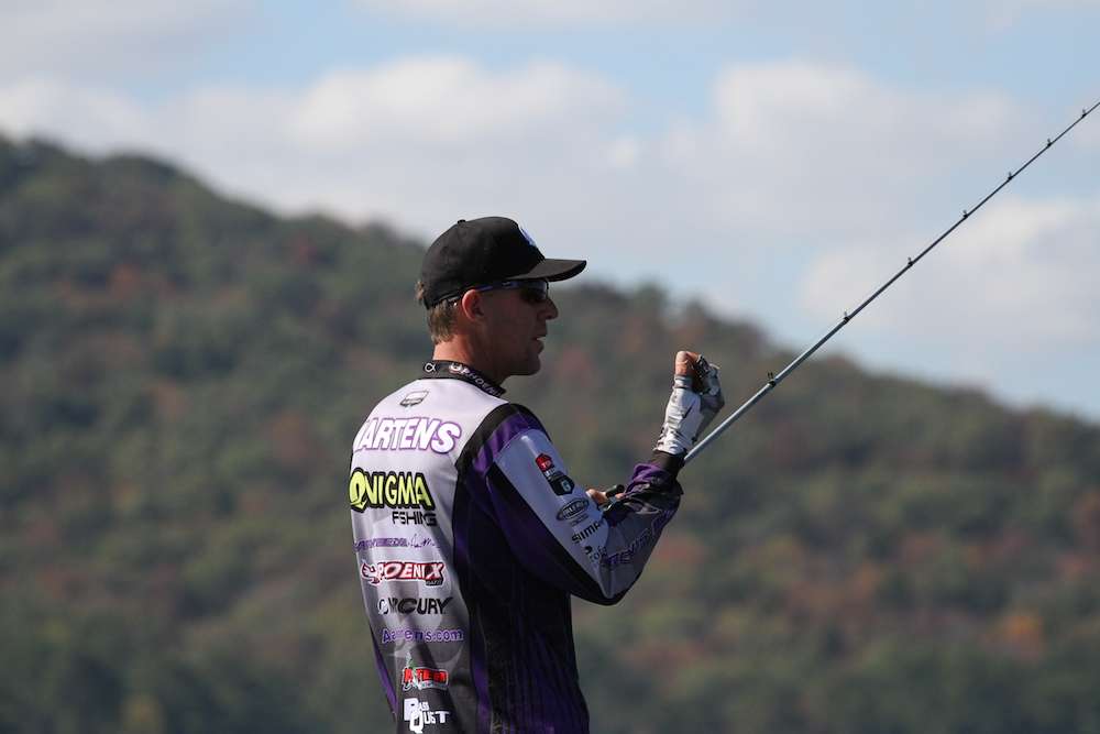 Martens feels his line because bass have been lightly biting his punching rig.