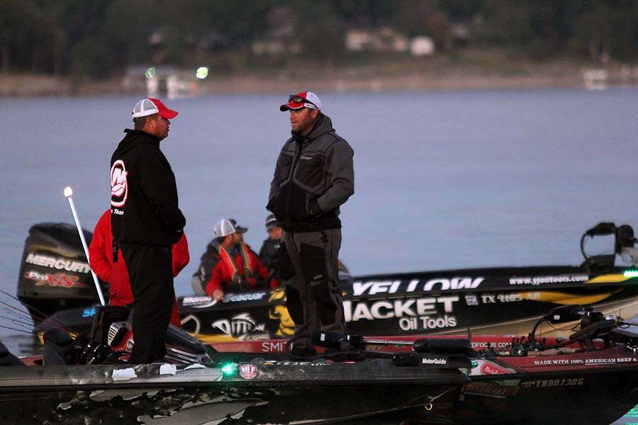 Watson and Luke Clausen pause for a quick conversation prior to the start of the Bass Pro Shops Central Open presented by Allstate.