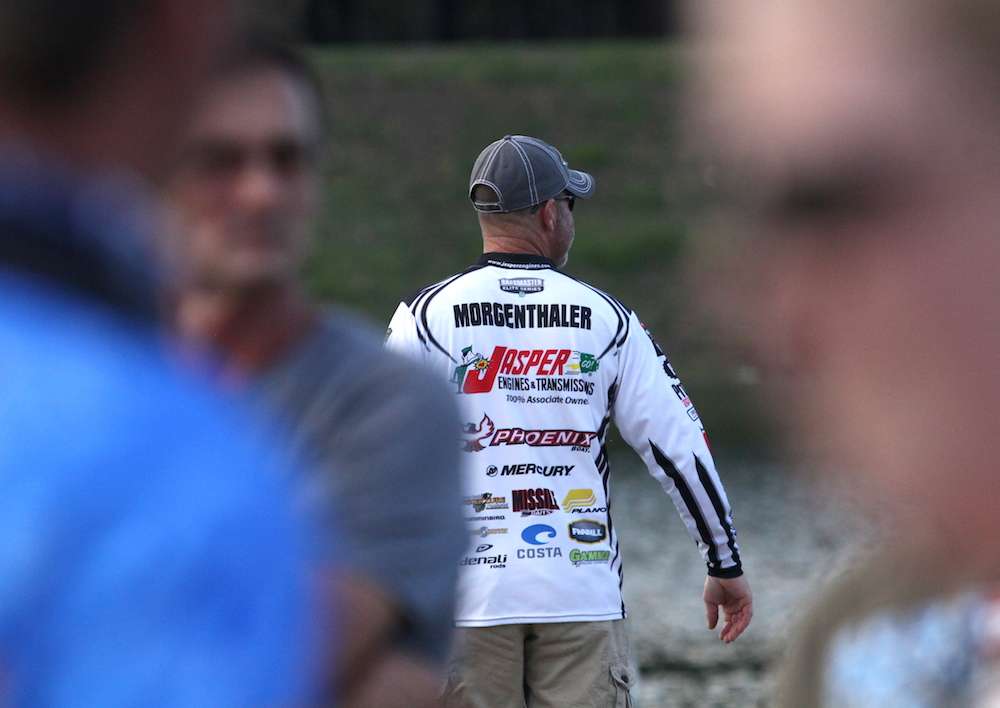 Chad Morgenthaler heads down the hill after weighing an 8-pound, 12-ounce monster. 