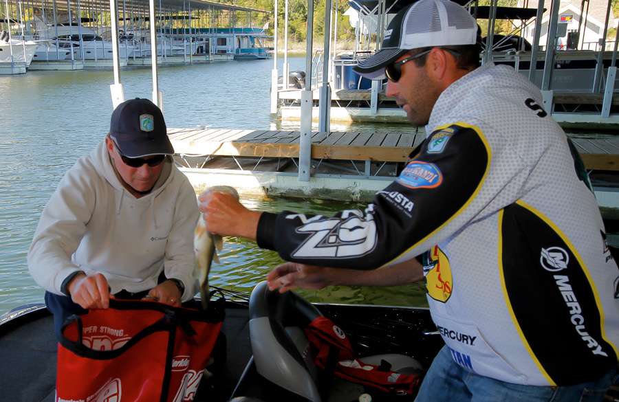Casey Scanlon bags his fish at the end of the day. Scanlon won a Central Open held here in 2012.