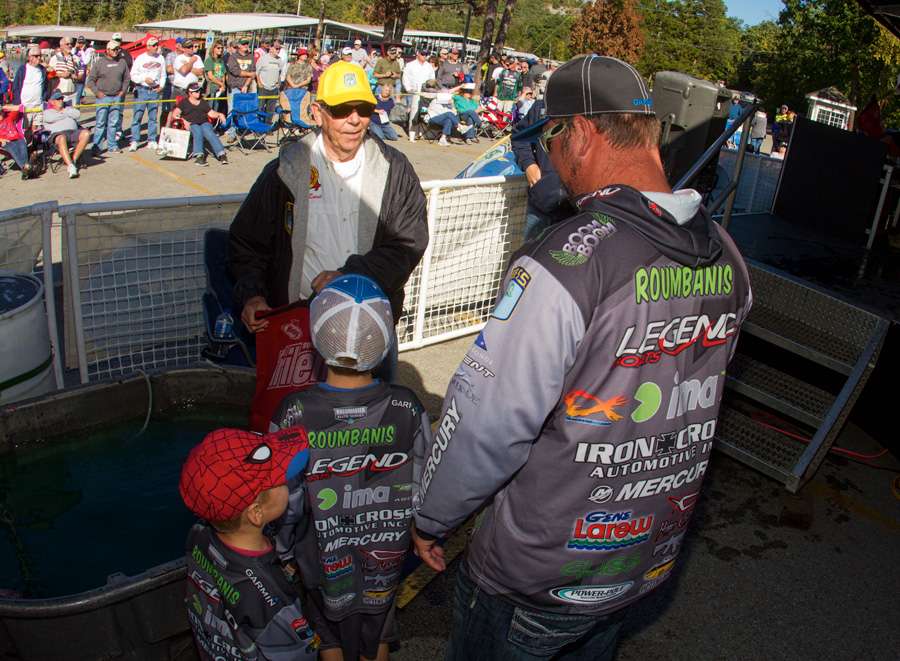 Fred Roumbanis had both of his sons at the holding tanks to help carry his fish onto the weigh-in stage. 