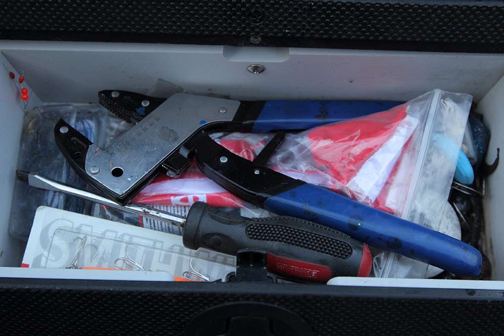 Behind the passenger seat is a box full of tools for whatever issues he may run in to. 