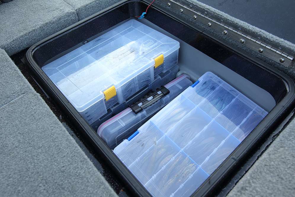 Moving across the back deck you'll find more plastics stuffed inside a storage compartment. 