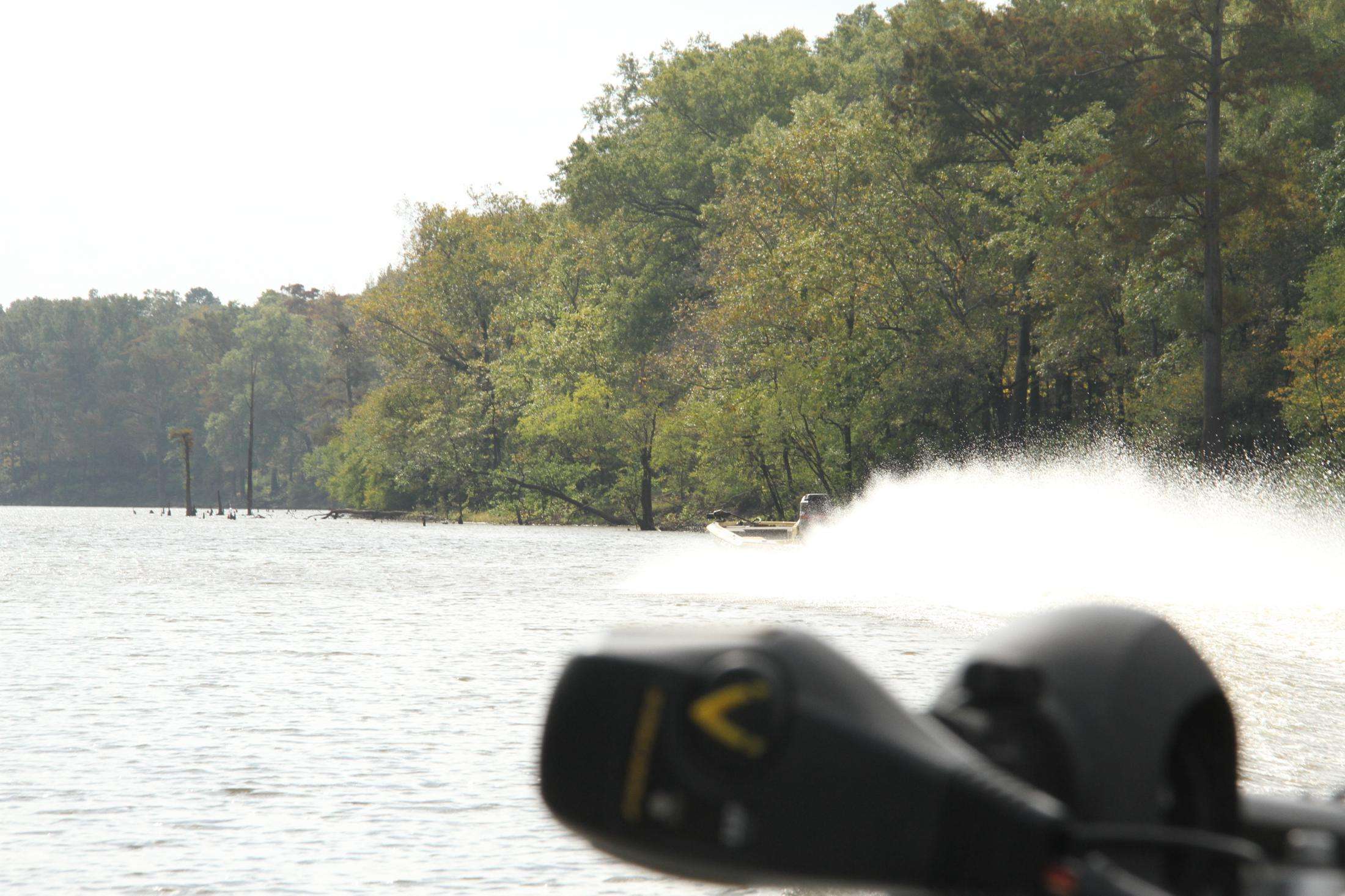 As we continue up the river, we see another competitor burning gas to his next spot.
